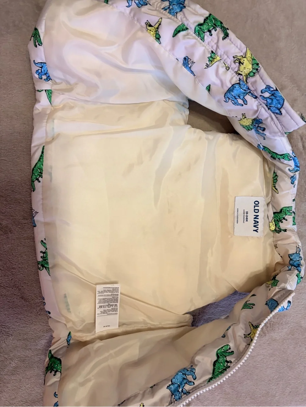 Old Navy White Kids Dino Puffer Vest with Green, Blue & Yellow Dinosaurs